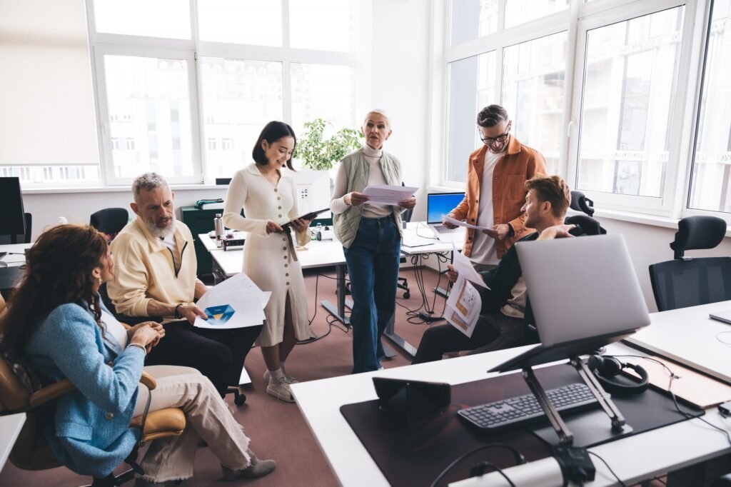 Businesspeople discussing ideas in workshop